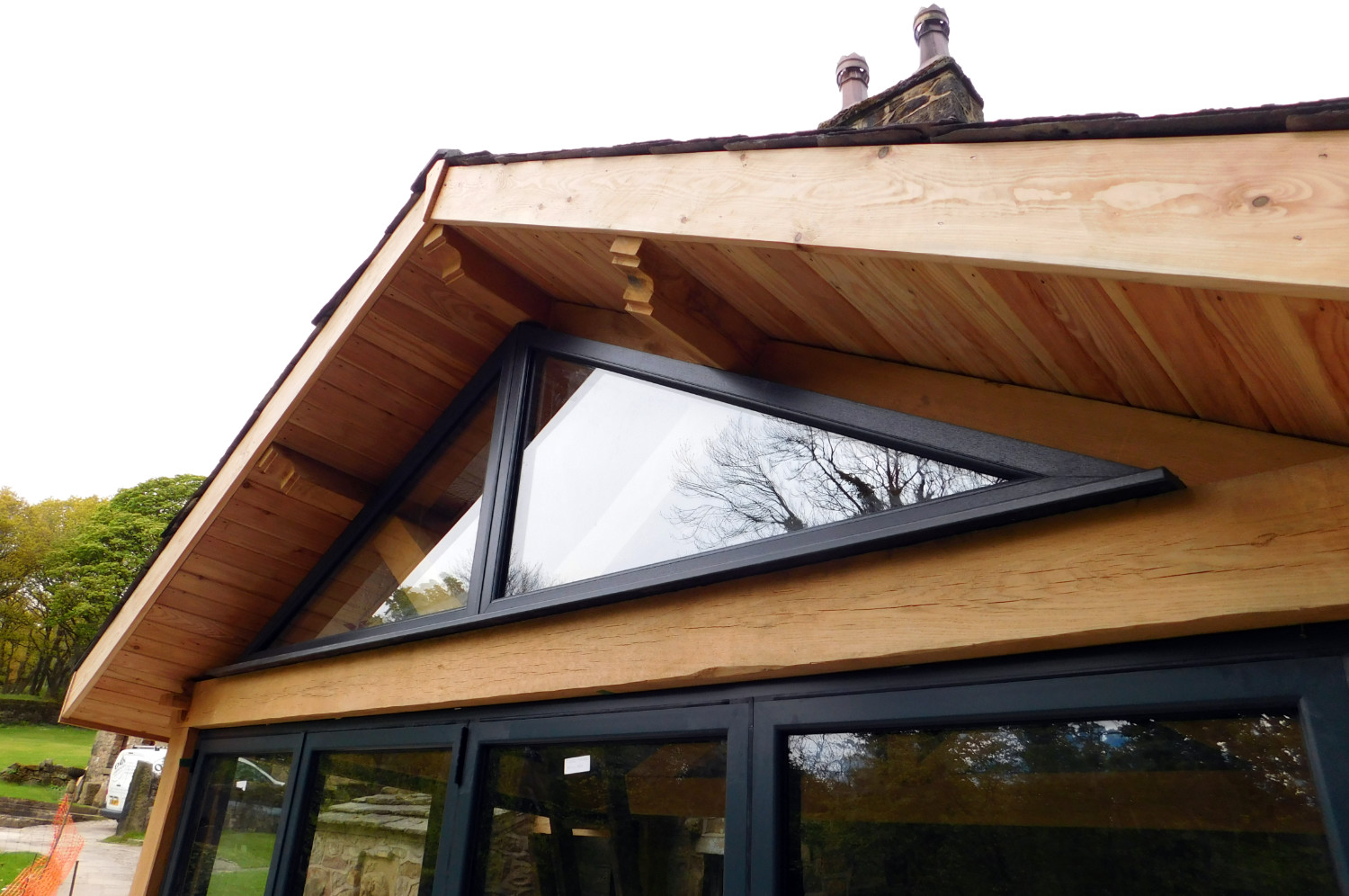 Extension with traditional Oak Frame, stone walls and slate roof