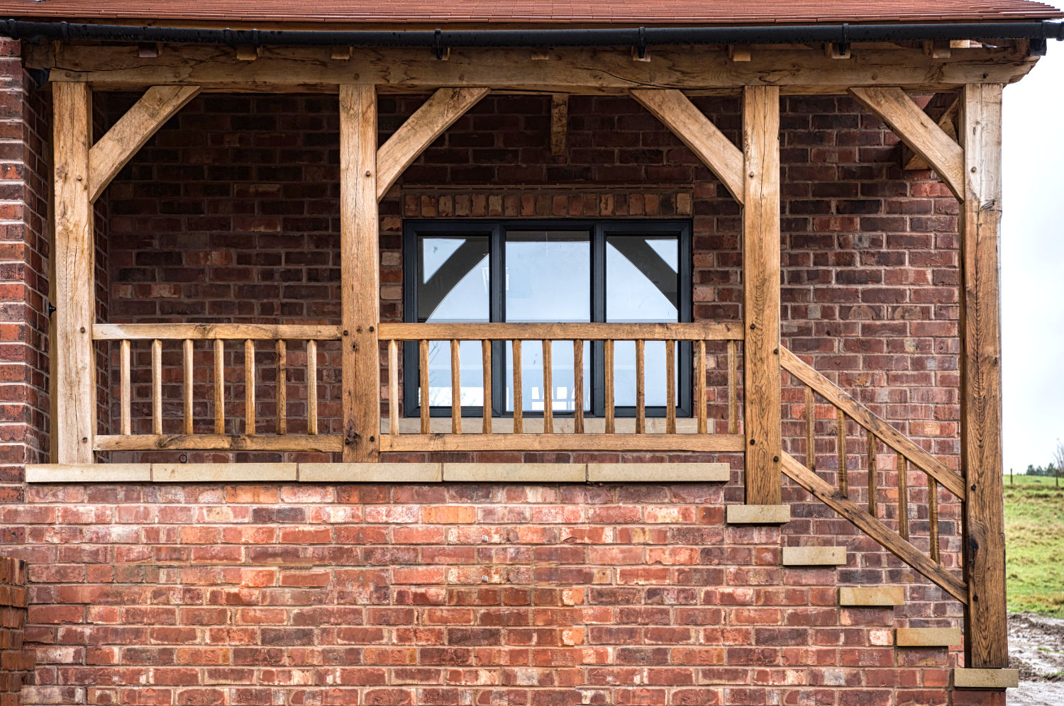 Custom made oak veranda with diamond spindle balustrade, Oak Carpentry, Lancs, 2021
